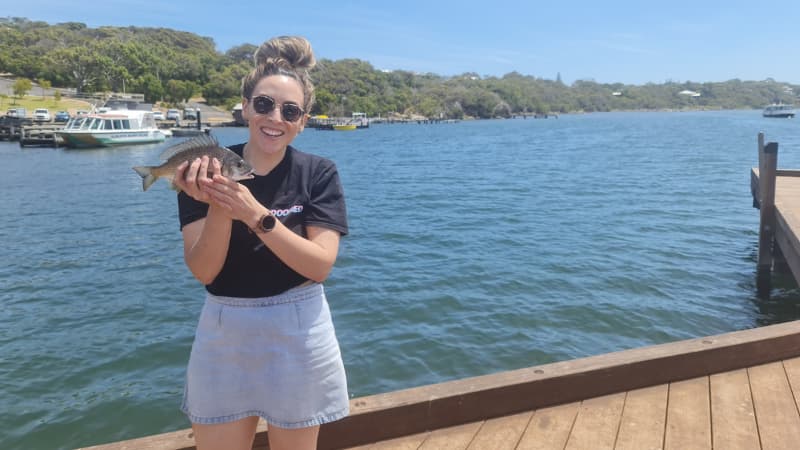 Image of Nadia holding a black bream at Ellis St Jetty