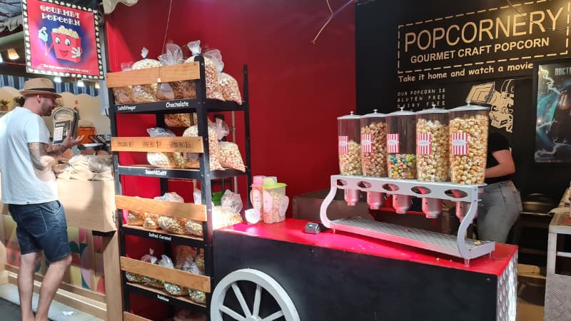 Popcorn stall at Fremantle Markets with different flavours on display