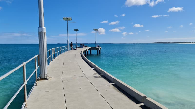Jurien Bay Jetty extends out into the bright blue water