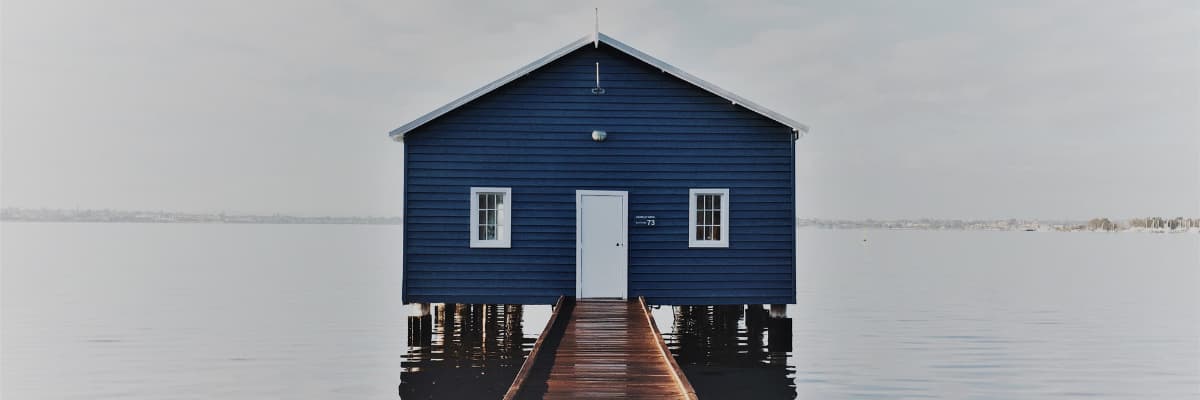 Perth's blue boatshed sits over the water