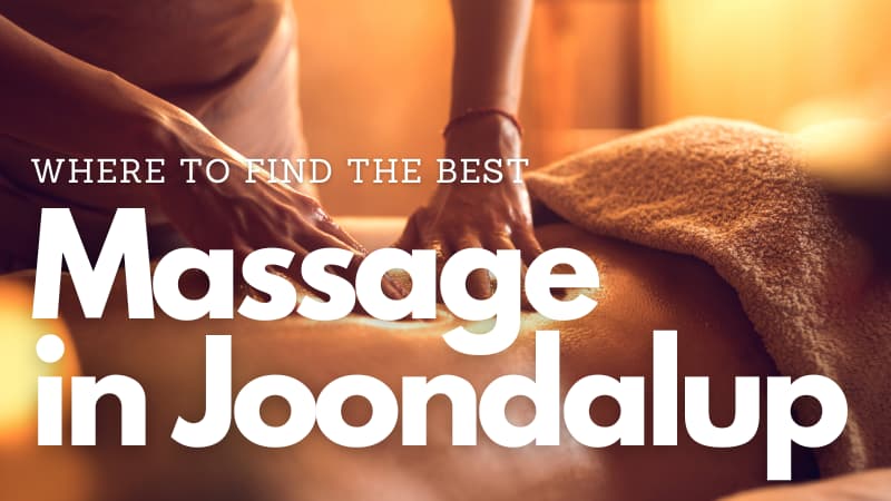 Massage therapist massages a client's back