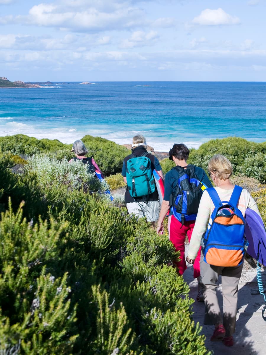 Margaret River Hike A group of people hike near Margaret River