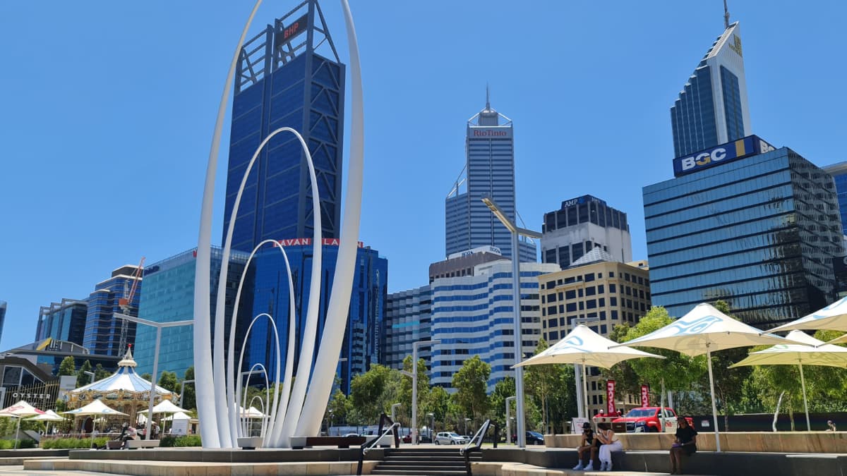 Elisabeth Quay Skyline view of Perth CBD and modern public art at Elizabeth Quay under clear winter skies