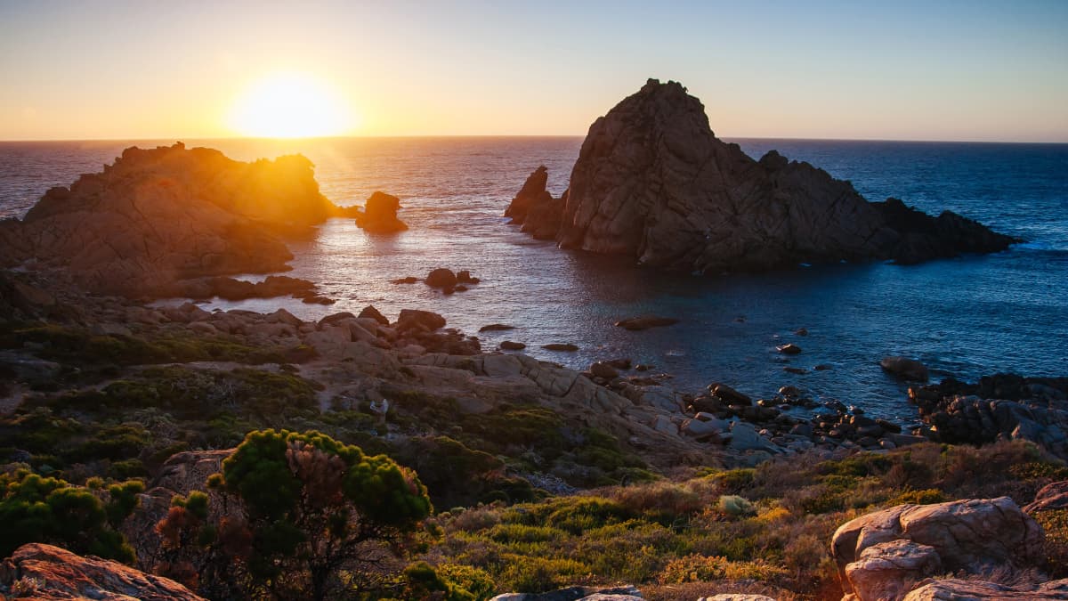 Sugarloaf Rock Sugarloaf Rock at sunset with rugged coastline and ocean views near Cape Naturaliste